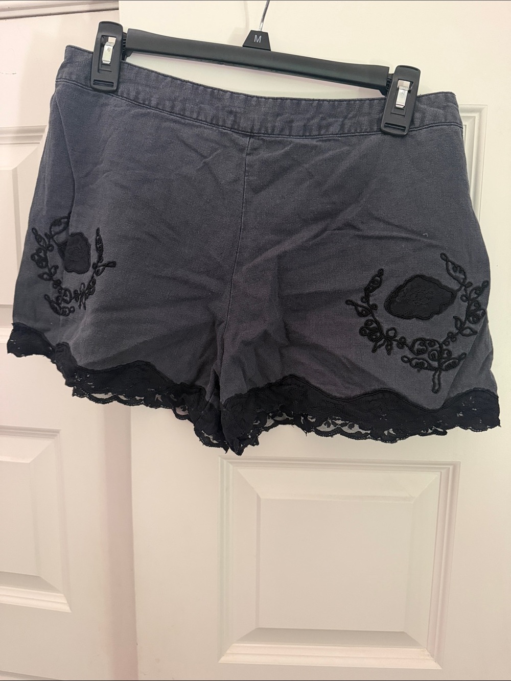 Free people flat front zip side shorts with black lace embroidery and trim